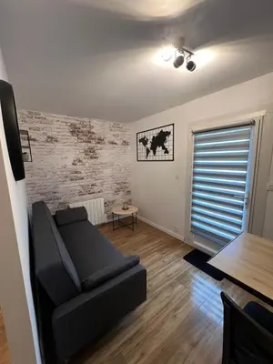 Coin salon dans l'établissement Appartement avec terrasse