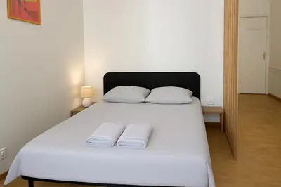 Un ou plusieurs lits dans un hébergement de l'établissement ღ Belle Epoque - Hypercentre, cosy & wifi