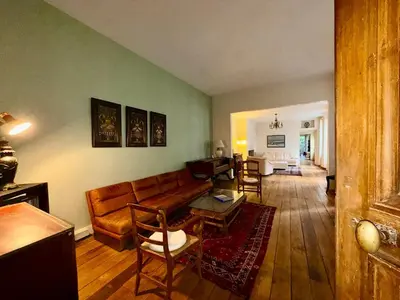 Coin salon dans l'établissement La Maison de la Glycine
