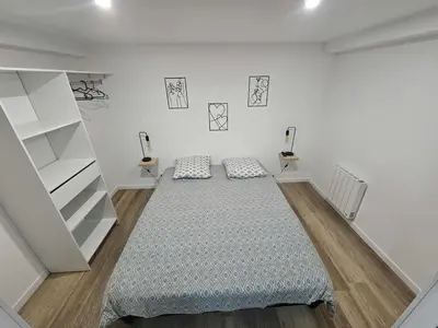 Un ou plusieurs lits dans un hébergement de l'établissement Apartment