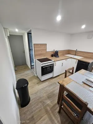 Coin salon dans l'établissement Apartment