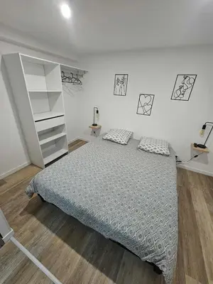 Un ou plusieurs lits dans un hébergement de l'établissement Apartment