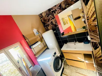 Cuisine ou kitchenette dans l'établissement Charmante petite maison avec jardin et parking-Niort Centre