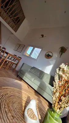 Coin salon dans l'établissement Cottage Atypique