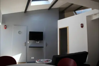 Télévision ou salle de divertissement dans l'établissement 40 m apartment facing the Old Port of La Rochelle