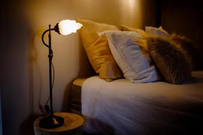 Un ou plusieurs lits dans un hébergement de l'établissement Chez Guilem chambre rose