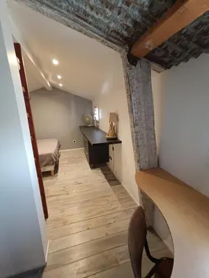 Cuisine ou kitchenette dans l'établissement L'Atelier du Clos avec Jacuzzi