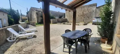 Terrasse ou espace extérieur de l'établissement Maison confortable 8 personnes - 4 chambres -