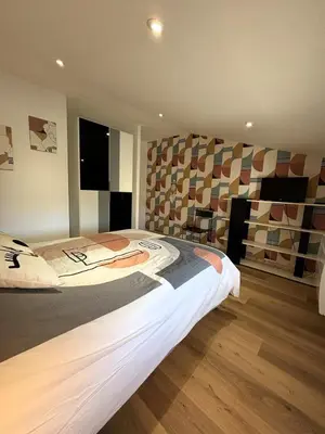 Un ou plusieurs lits dans un hébergement de l'établissement Grand Gîte Vivonne 8 personnes, Terrasse, Confort, babyfoot