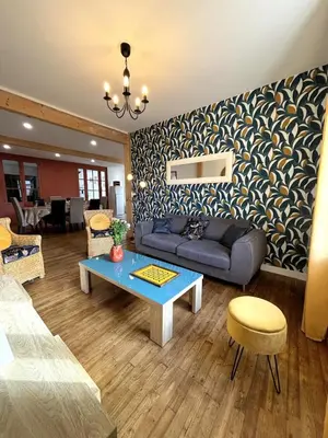 Coin salon dans l'établissement Grand Gîte Vivonne 8 personnes, Terrasse, Confort, babyfoot