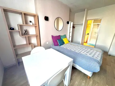 Un ou plusieurs lits dans un hébergement de l'établissement Beau Studio 2 en Centre Ville de Niort au calme proche Gare