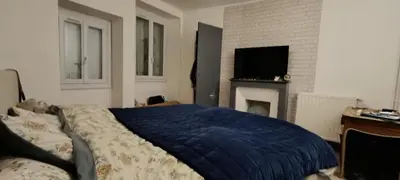 Télévision ou salle de divertissement dans l'établissement Studio Confort Niort