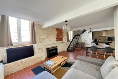 Coin salon dans l'établissement Bright triplex in the heart of La Rochelle
