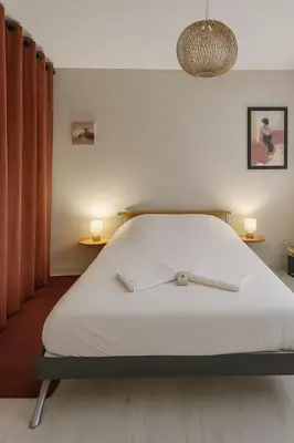 Un ou plusieurs lits dans un hébergement de l'établissement Maison Chardonnerets - Poitiers