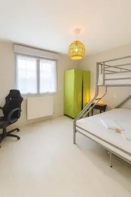 Un ou plusieurs lits dans un hébergement de l'établissement Maison Chardonnerets - Poitiers
