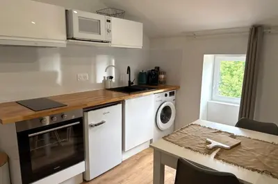 Cuisine ou kitchenette dans l'établissement Le Repos