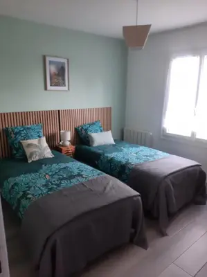 Un ou plusieurs lits dans un hébergement de l'établissement La Maison d'à côté