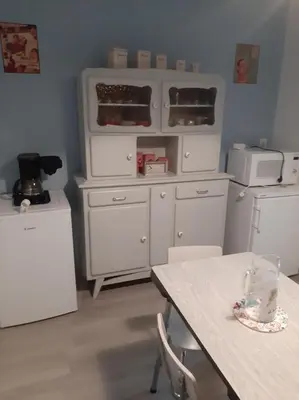 Cuisine ou kitchenette dans l'établissement La Maison d'à côté