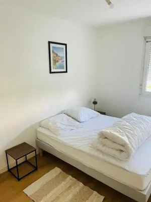 Un ou plusieurs lits dans un hébergement de l'établissement Appartement RDC meublé avec 2 chambres