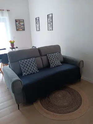 Coin salon dans l'établissement L'escale familiale Gite le cosy pour 6 personnes