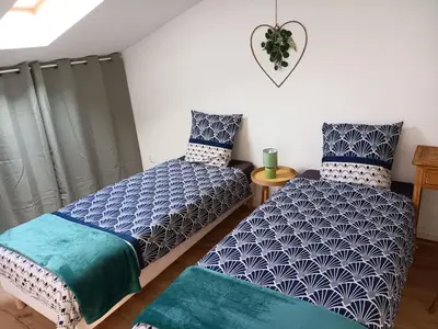 Un ou plusieurs lits dans un hébergement de l'établissement L'escale familiale Gite le cosy pour 6 personnes