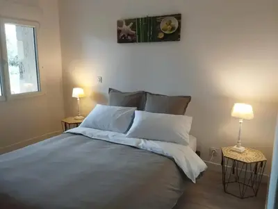 Un ou plusieurs lits dans un hébergement de l'établissement Maison conviviale avec jardin à Saint-Maurice-la-Clouère