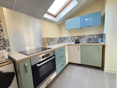 Cuisine ou kitchenette dans l'établissement Maison Cosy & Colorée à Valence-en-Poitou Jardin & Parking