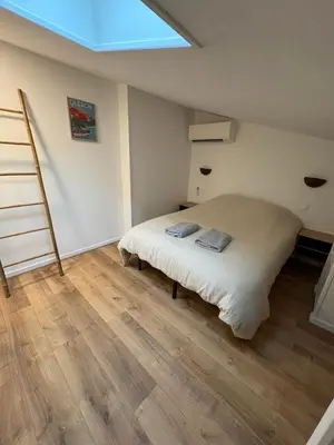 Un ou plusieurs lits dans un hébergement de l'établissement Maison au calme , centre de Rochefort