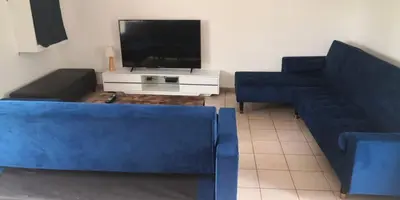 Télévision ou salle de divertissement dans l'établissement Gîte proche du Futuroscope