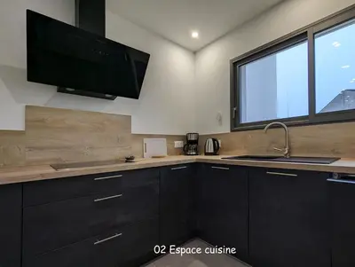 Cuisine ou kitchenette dans l'établissement home family