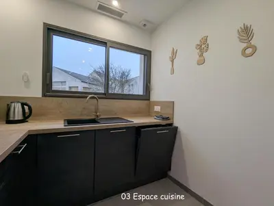 Cuisine ou kitchenette dans l'établissement home family