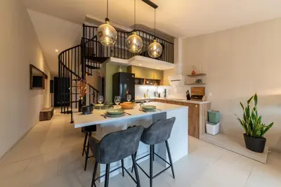Cuisine ou kitchenette dans l'établissement Le Picasso - A 10 min de La Rochelle