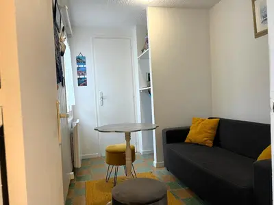 Coin salon dans l'établissement ღ Ozeo - T2,calme, proche plage et commodités