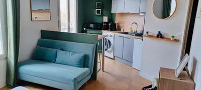 Cuisine ou kitchenette dans l'établissement Appartement cosy 2 pieces hyper centre ville Place de la Breche