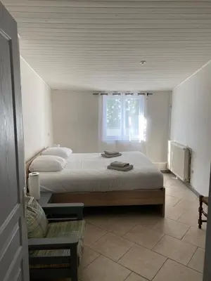 Un ou plusieurs lits dans un hébergement de l'établissement Maison chaleureuse en pleine campagne
