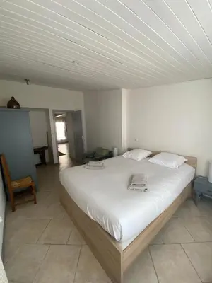 Un ou plusieurs lits dans un hébergement de l'établissement Maison chaleureuse en pleine campagne