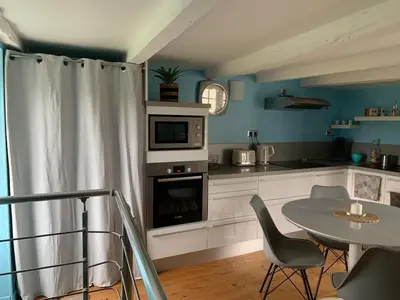 Cuisine ou kitchenette dans l'établissement Maison à 16km du futuroscope