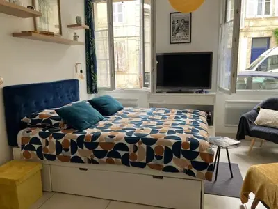 Un ou plusieurs lits dans un hébergement de l'établissement Centre ville studio meublé de tourisme classé 2 étoiles