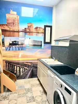 Cuisine ou kitchenette dans l'établissement Mezzanines 50 m de la plage