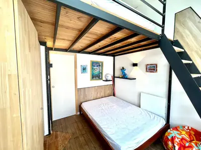 Un ou plusieurs lits dans un hébergement de l'établissement Mezzanines 50 m de la plage