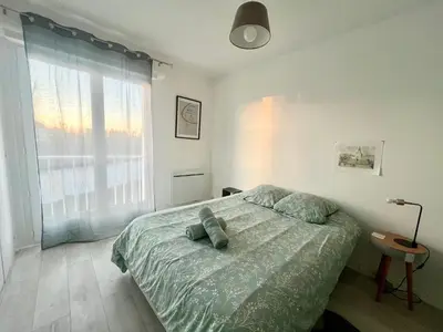 Un ou plusieurs lits dans un hébergement de l'établissement APPART OCEAN - Parking Privée - Wifi Gratuit - Proche Plage & Vieux-Port
