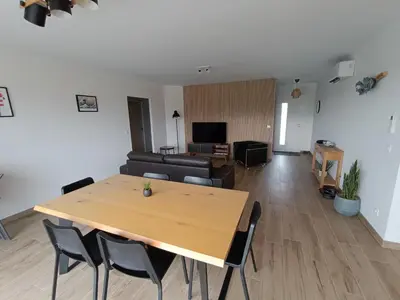 Coin salon dans l'établissement Maison de vacances avec jardin