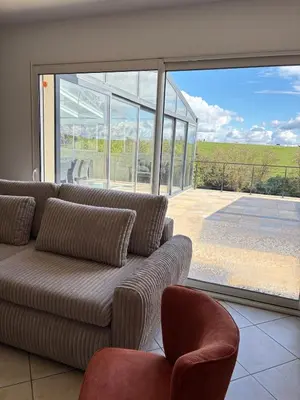 Coin salon dans l'établissement Maison pour réunion de famille Gîte des Tamaris