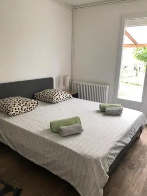 Un ou plusieurs lits dans un hébergement de l'établissement Maison, terrasse, parking, 4lits, et canapé lit, 7personnes