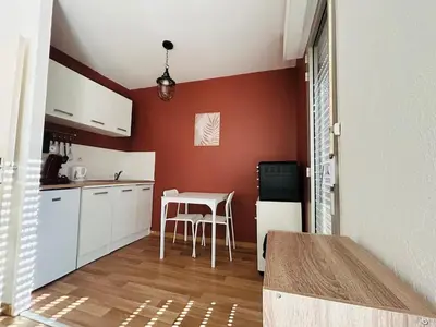 Cuisine ou kitchenette dans l'établissement Bel Air Appartement