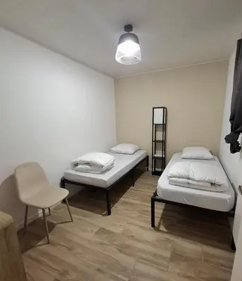 Un ou plusieurs lits dans un hébergement de l'établissement Gîte à la ferme ''Chez Jean''