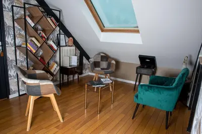 Coin salon dans l'établissement Chambre Coco