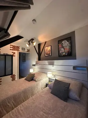 Un ou plusieurs lits dans un hébergement de l'établissement Les chambres du Bocage - Chambre Marylin