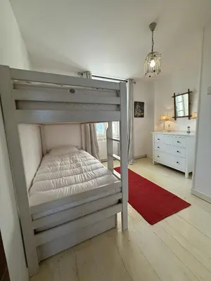 Un ou plusieurs lits dans un hébergement de l'établissement Gite maison charentaise - piscine privée