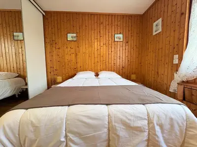 Un ou plusieurs lits dans un hébergement de l'établissement La Rohannaise - Maison Charentaise avec Sauna